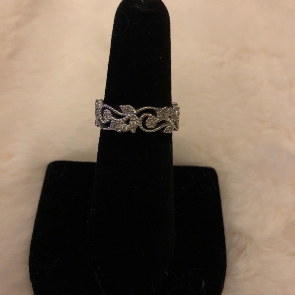 Intricate sterling silver flower filigree ring with natural white diamonds!
